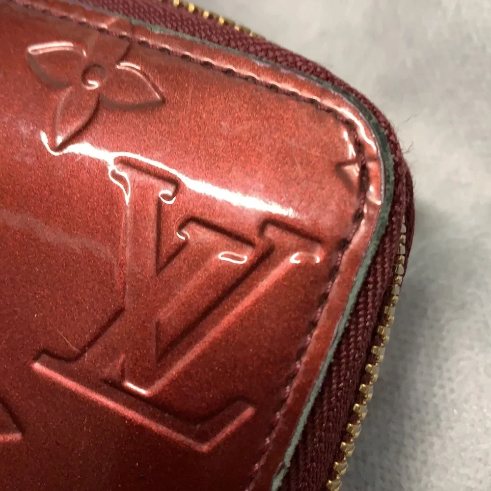 authentic  Louis Vuitton  Zippy Wallet Amarante vernis